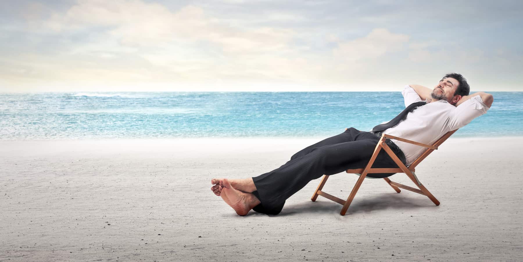 man relaxing on the beach