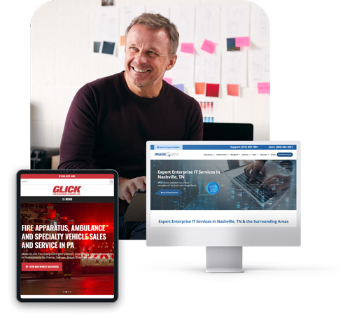 A happy business man showcased with two well-designed websites on desktop and tablet